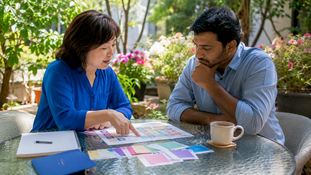 Tutor and learner engaged in Japanese lesson