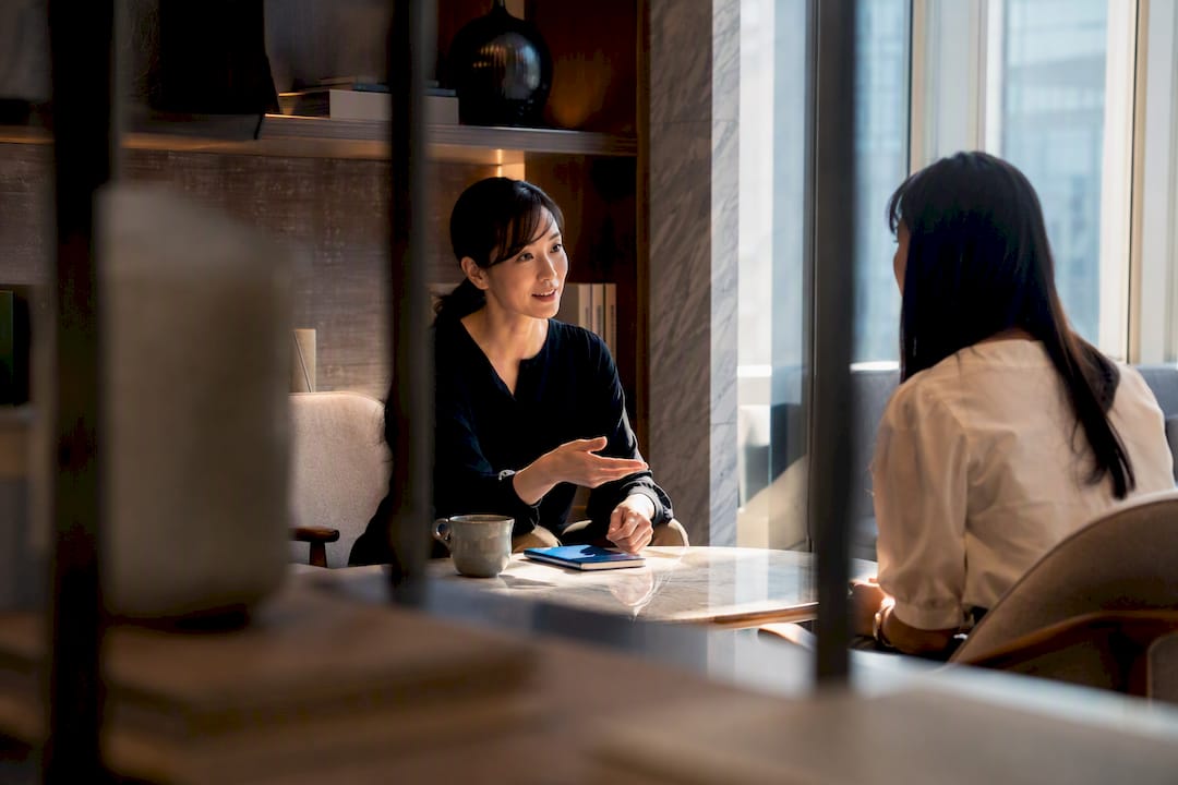 Learner consulting a Japanese language instructor